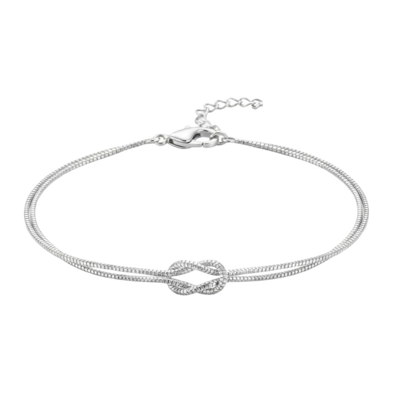Bracelet fin en acier inoxydable argenté avec nœud central élégant, chaîne double délicate ajustable.