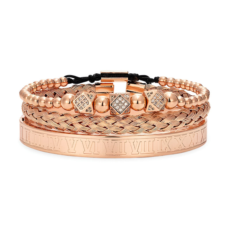 Trio de bracelets en acier inoxydable or rosé, design tressé, perlé et lisse avec gravure chiffres romains.