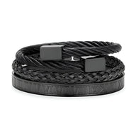 Trio de bracelets homme en acier inoxydable noir, design tressé et câble avec détails romains gravés.
