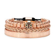 Trio de bracelets en acier inoxydable or rosé avec tête de léopard et détails tressés.