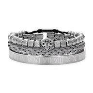 Trio de bracelets en acier inoxydable argenté, avec tête de léopard et bracelet à maillons tressés.