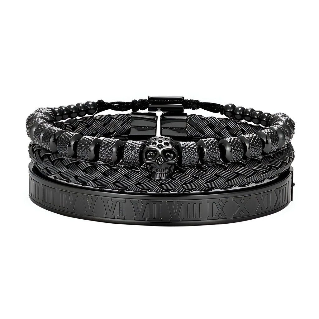 Trio de bracelets noirs en acier inoxydable, tresse, tête de mort et bracelet gravé chiffres romains.