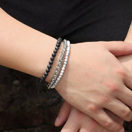 Trio de bracelets homme en pierres naturelles noire, gris argenté et blanc marbré, style Helsinki.