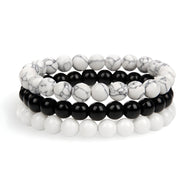 Trio de bracelets mixte en howlite blanche et noire, design naturel élégant.
