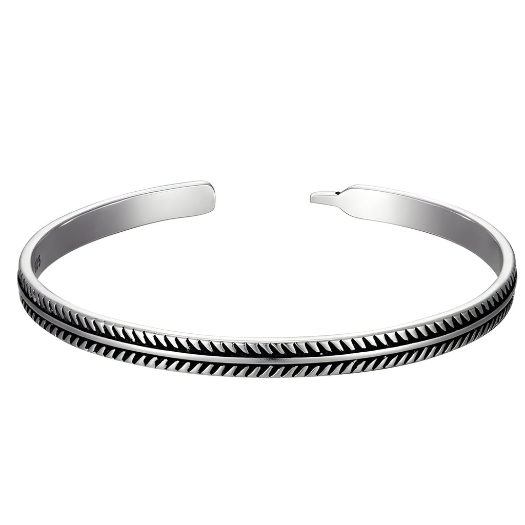 Bracelet tibétain homme en argent avec motif chevrons gravés, finition mate et brillante.