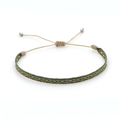 Bracelet homme tibétain vert en agate avec finition argentée et cordon ajustable.