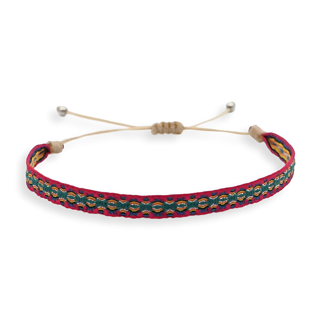 Bracelet tibétain multicolore tissé avec fermoir réglable en corde beige.