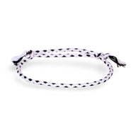 Trio de bracelets tibétains en corde noire et blanche tressée avec nœuds ajustables.