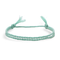 Trio de bracelets tibétains bleu en coton avec détails en cuivre, style ajustable pour homme.