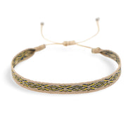 Bracelet tibétain bleu en coton avec motifs géométriques noirs et cuivre, réglable homme.