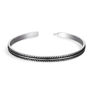 Bracelet rigide en cuivre argenté avec motif chevrons noirs pour homme.