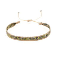 Bracelet tibétain en coton multicolore avec motif géométrique, fermeture ajustable en coton beige.