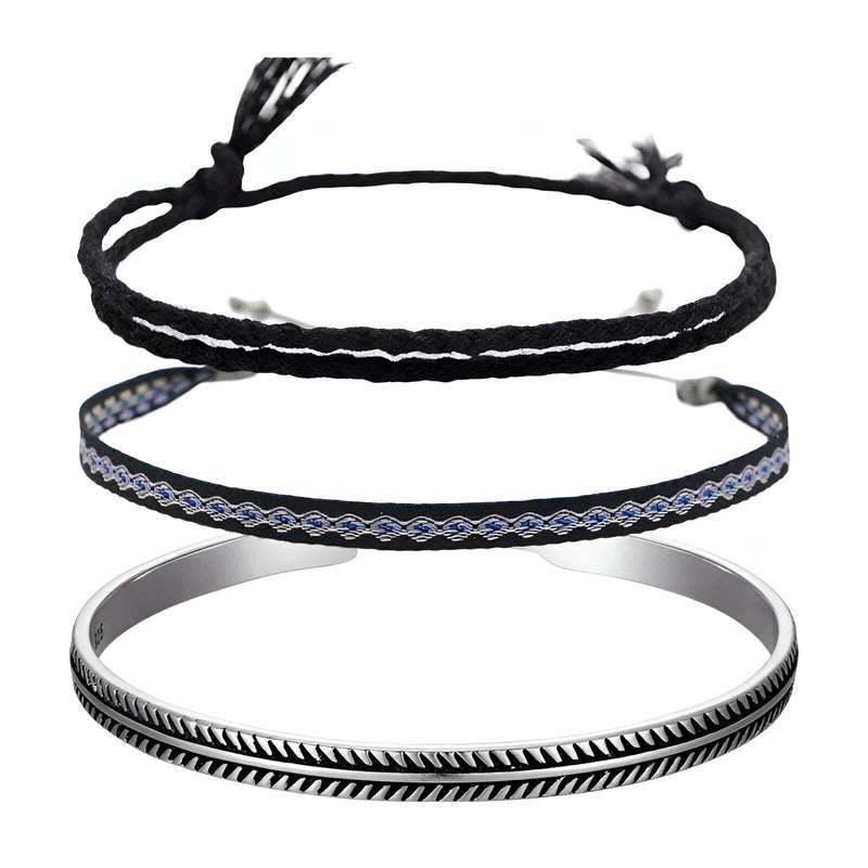 Trio de bracelets tibétains homme en coton noir et argent, motifs tressés et gravés.
