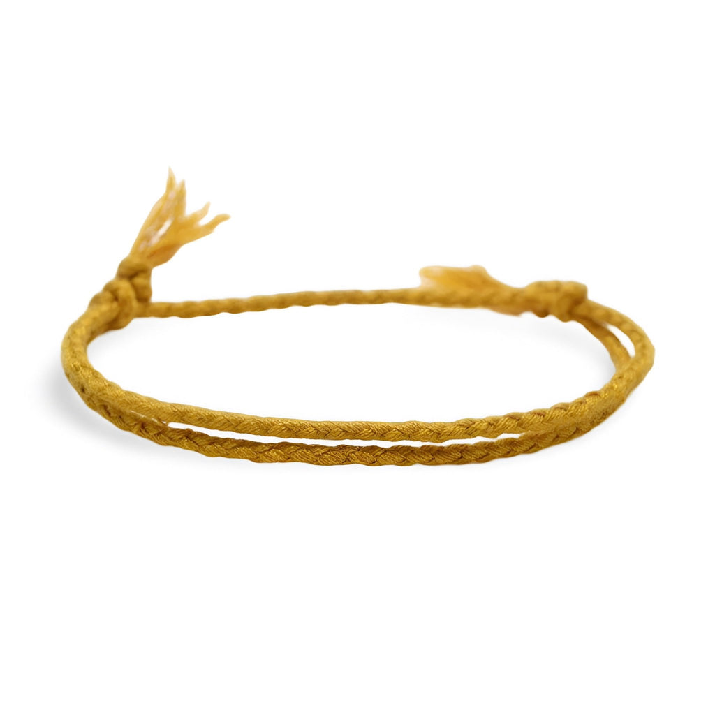 Bracelet tibétain jaune en coton tressé avec nœuds ajustables pour homme.