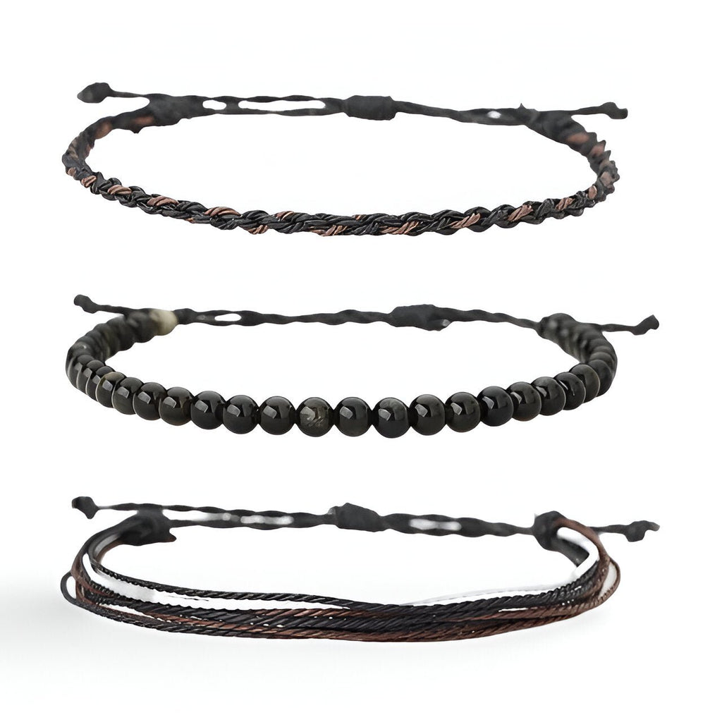 Trio de bracelets tibétains pour homme en pierres noires et fil ciré noir et marron.