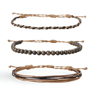 Trio de bracelets tibétains homme en pierres naturelles brunes et fil ciré marron tressé.