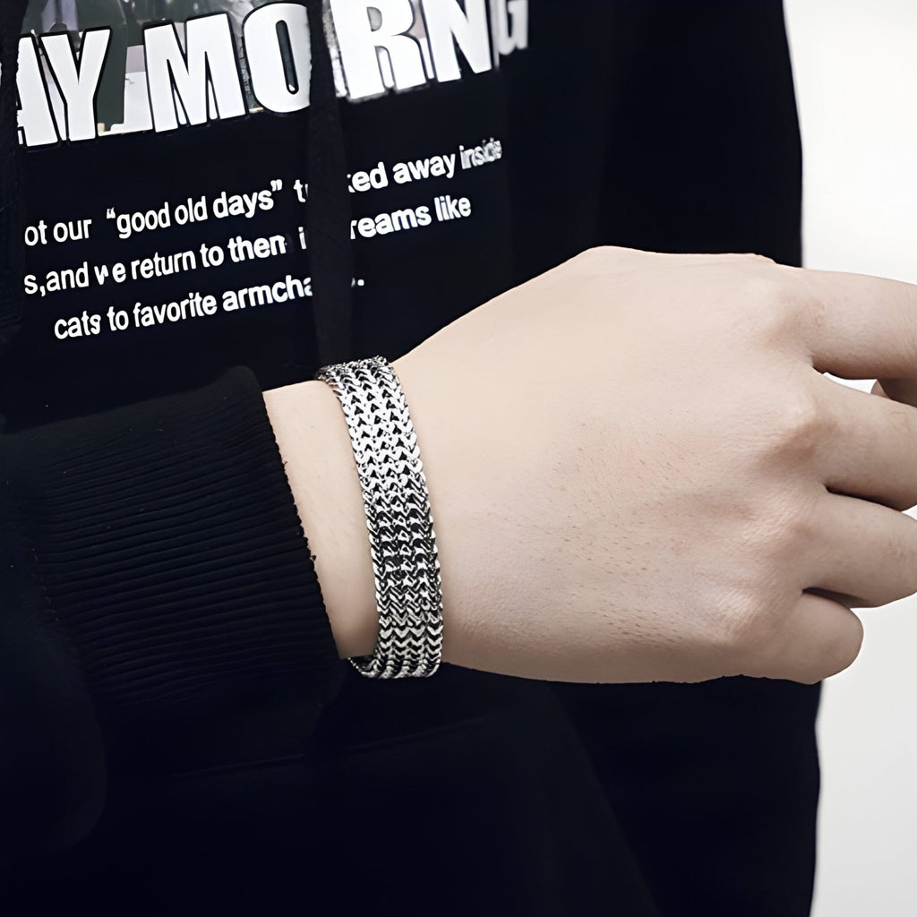 Bracelet homme en acier inoxydable argenté, maillons inspirés de bracelet de montre, finition brillante.