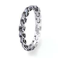 Bracelet homme en acier inoxydable argenté avec motif serpent texturé style Anatole.