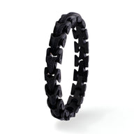 Bracelet homme en acier inoxydable noir mat, design chaîne serpent moderne et élégant.