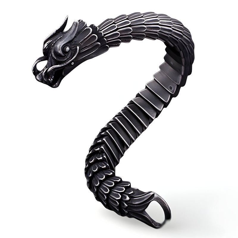 Bracelet en acier inoxydable noir mat en forme de dragon avec détails d'écailles et tête sculptée.