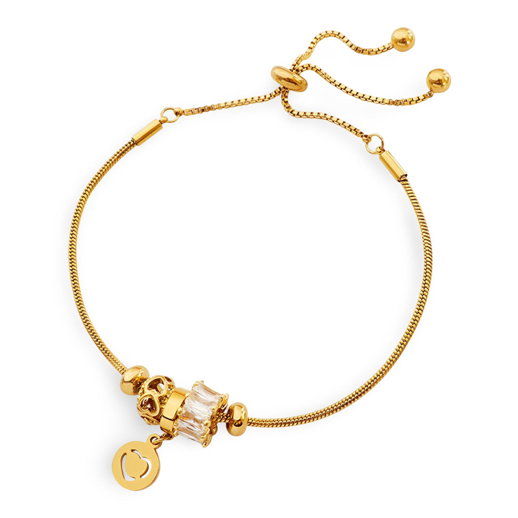 Bracelet ajustable en titane doré avec pendentif coeur et pierres de zircon brillantes.