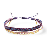 Bracelet Thaliane avec chaîne plaqué or, pierres naturelles rouges et tresse violet et bleu.