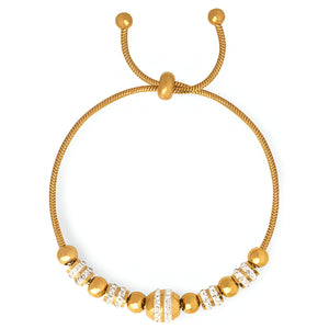 Bracelet réglable en titane plaqué or avec perles et cristaux étincelants.
