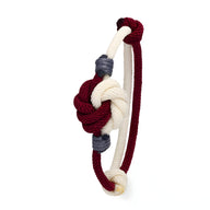 Bracelet cordon bordeaux et crème avec noeud central et détails gris, style marin.