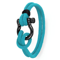 Bracelet cordon turquoise pour homme avec mousqueton noir en métal, style nautique.