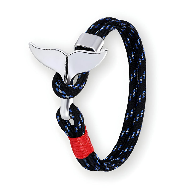 Bracelet cordon noir à motifs bleus avec pendentif queue de baleine en métal argenté et détail rouge.