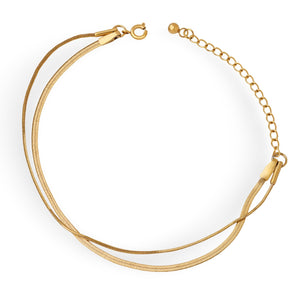 Bracelet double rang en titane plaqué or avec fermoir mousqueton et chaîne d'extension fine.