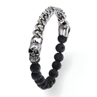 Bracelet homme en acier inoxydable argent avec pierres volcaniques noires et têtes de mort doubles en finition polie.