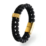 Bracelet homme double tour perles noires et cuir tressé noir avec croix et fermoir dorés.