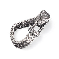 Bracelet homme en acier inoxydable argenté à maillons tressés avec fermoir tête de serpent sculpté.