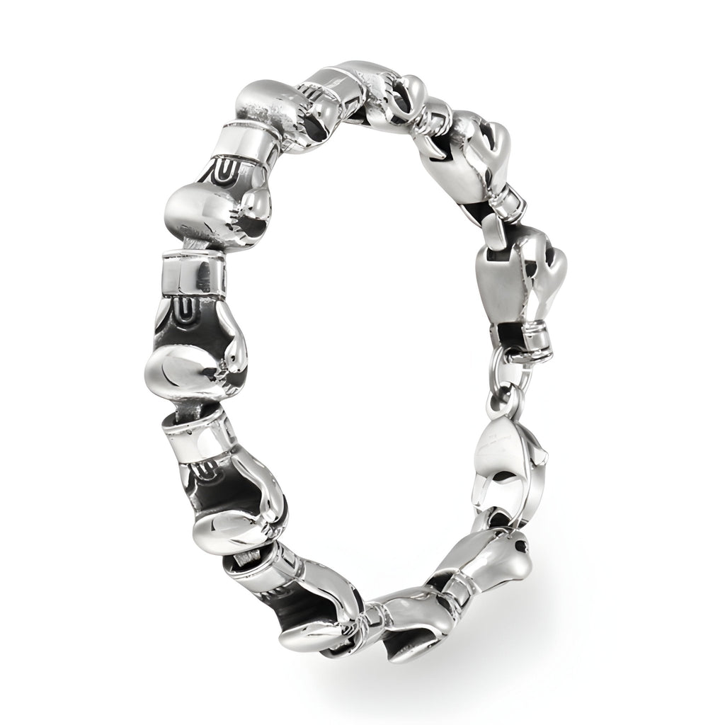 Bracelet homme en acier inoxydable argent avec maillons en forme de gants de boxe alignés.
