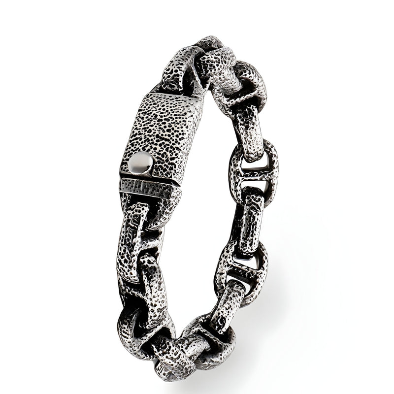 Bracelet homme en acier inoxydable argenté à maillons texturés aspect rocheux avec fermoir gravé Manu.
