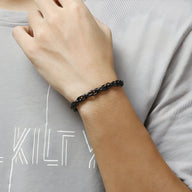 Bracelet homme en acier inoxydable noir, maille forçat classique, modèle Samy, finition brillante.