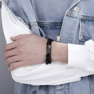 Bracelet homme double maille noir en acier inoxydable avec fermoir rectangulaire élégant.