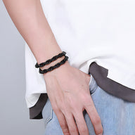 Bracelet homme double-rangs en acier inoxydable noir avec maillons torsadés élégants.