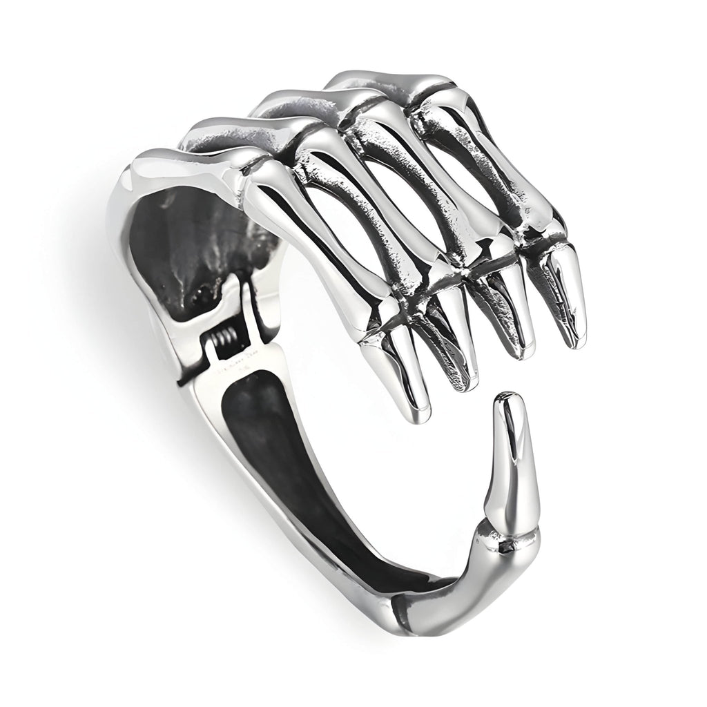 Bracelet en acier inoxydable argenté en forme de main de squelette ouverte pour homme.