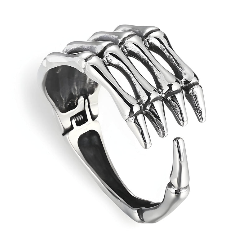 Bracelet en acier inoxydable argenté en forme de main de squelette ouverte pour homme.