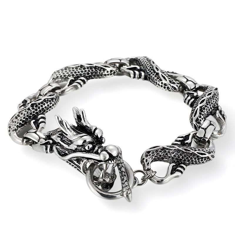 Bracelet homme en acier inoxydable argenté, design dragon avec détails texturés et fermoir anneau élégant.