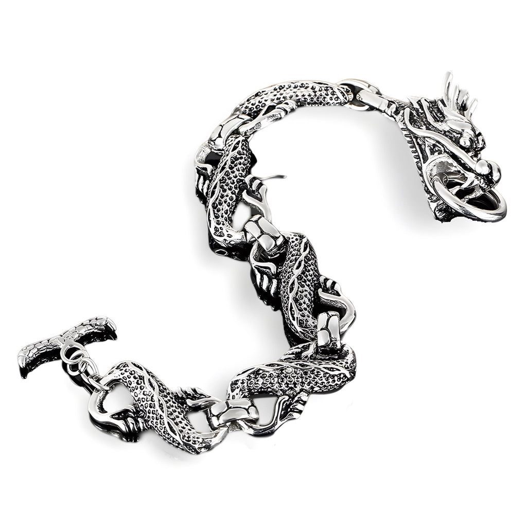 Bracelet homme en acier inoxydable argenté avec motif dragon sculpté détaillé.