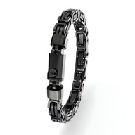 Bracelet homme en acier inoxydable noir à maille compacte avec fermoir rectangulaire robuste.