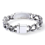 Bracelet homme en acier inoxydable argenté avec motifs celtique et croix entrelacés, fermoir rectangulaire lisse.
