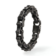 Bracelet homme en acier inoxydable noir à motifs celtiques carrés gravés, fermoir sécurisé.