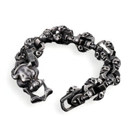 Bracelet homme en acier inoxydable gris avec maillons têtes de mort et tête de chien style Vidal.