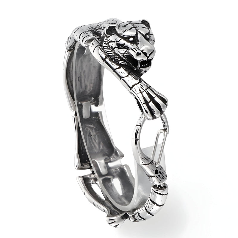Bracelet homme en acier inoxydable argenté avec tigre sculpté s'accrochant et détail articulé.