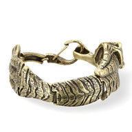 Bracelet homme en acier inoxydable doré avec motif tigre s'accrochant texturé.