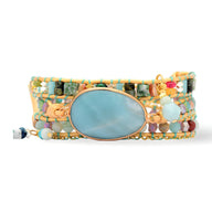 Bracelet multi-rangs bleu en pierres naturelles d'amazonite avec grand cabochon ovale serti or.